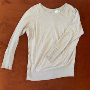 Sweater with buttons on the sleeve and down the back